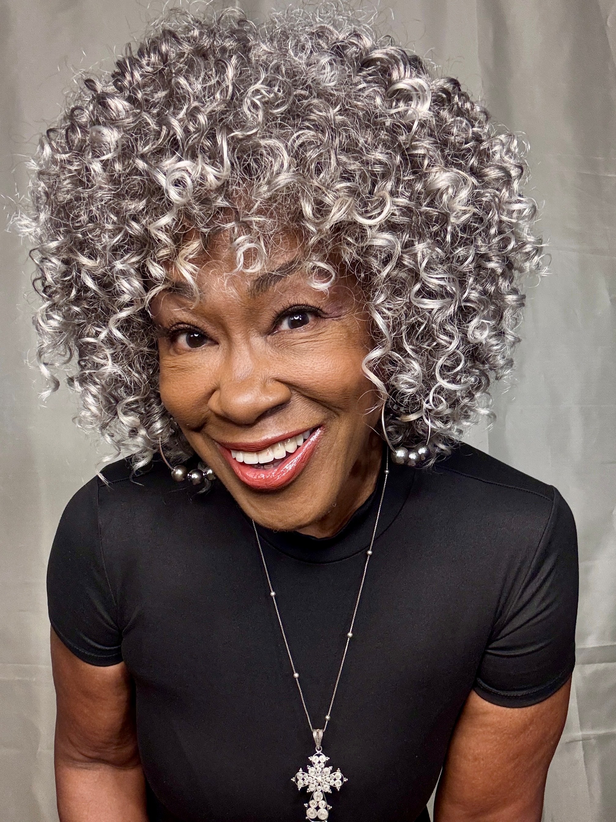 Angel with curley gray hair